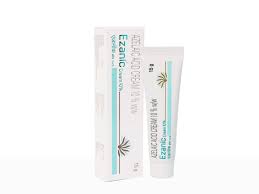 Aurochem Ezanic Cream 10% in a white tube with blue and green accents, shown on a neutral background.