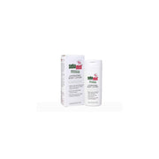 Sebamed Anti-Dry Hydrating Body Lotion for sensitive dry skin, showing a white bottle with blue and green label on a white background.